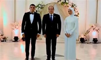 الرئيس السيسي يستجيب لدعوة ابنة شهيد شرطة ويحضر عقد قرانها| فيديو