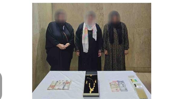 3 سيدات يستولون علي مشغولات ذهبية وعملات من مسكن شخص