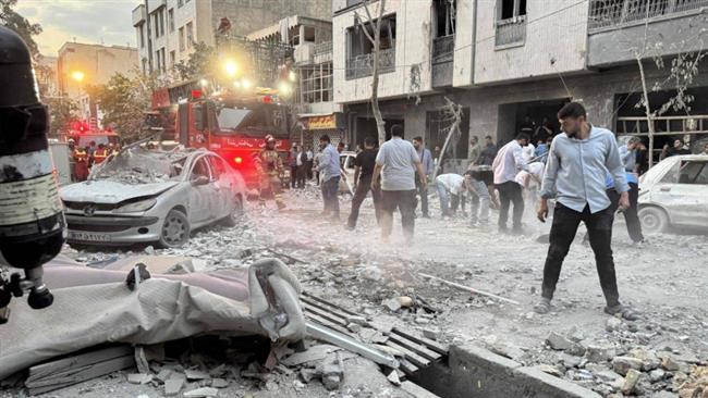 إدارة الإطفاء الإسرائيلية: مبانٍ عدة تضررت في حيفا نتيجة صواريخ إيرانية