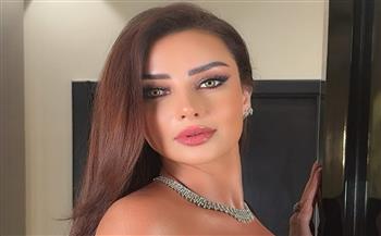 رضوى الشربيني بفستان كلاسيكي جميل
