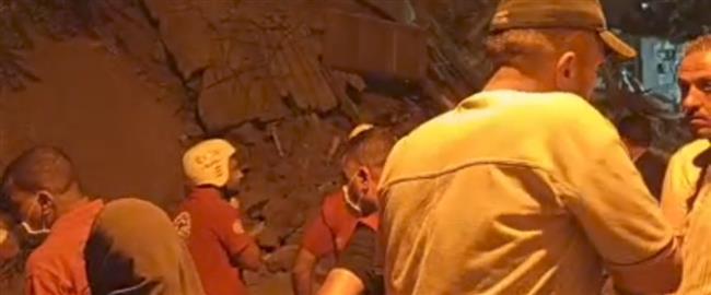  استخراج 7 مصابين وجثمانين من أسفل عقار السيدة زينب المنهار