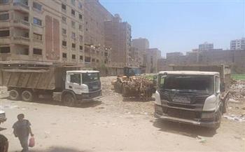 محافظة الجيزة ترفع 800 طن من المخلفات والرتش بحي العمرانية