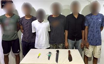 ضبط طرفي مشاجرة بالأسلحة البيضاء بسبب الخلاف على أولوية جمع الخردة في الجيزة