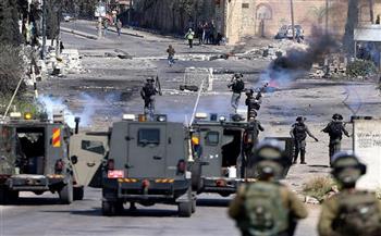 استشهاد شاب فلسطيني برصاص مستوطن إسرائيلي واعتقال 13 آخرين بالضفة الغربية