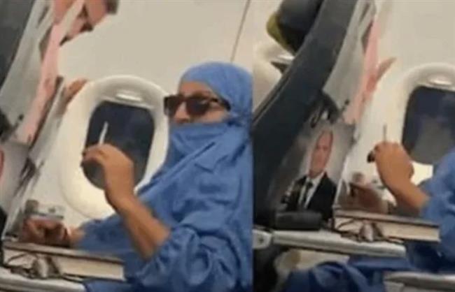 بسبب سيجارة.. راكبة تحاول إضرام النار في  طائرة بالجو (فيديو)