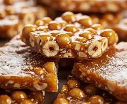 في المولد النبوي الشريف.. خطوات سهلة لتحضير قرص البندقية بالعسل 