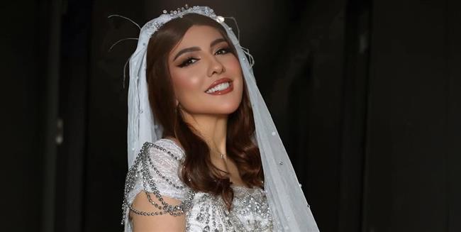 مي كساب تثير فضول جمهورها بإطلالة عروسة !