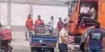 تصالح سائق وعامل بعد تداول فيديو لمشادة كلامية بينهم في الجيزة