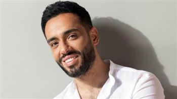 رامي جمال لجمهوره: إن شاء الله أقدملكم مزيكا جديدة في العام الجديد