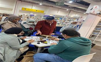 مدرسة خضير البورسعيدي لفنون الخط العربي في جناح «التنمية الثقافية» بمعرض الكتاب