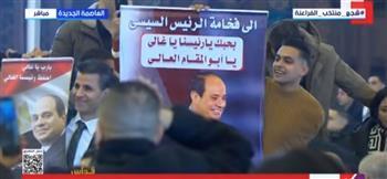 استقبال حافل بالورود واللافتات للرئيس السيسي في كاتدرائية ميلاد المسيح بالعاصمة الجديدة