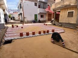 متابعة أعمال تركيب بلاط الإنترلوك بمدخل مجمع مدارس قرية منية السلامة بالرحمانية