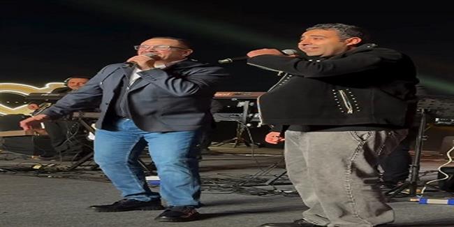 هشام عباس يحتفل بعيد ميلاد محمد عدوية على المسرح ويغنيان ناري ناري   