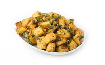 حضري أطباق البطاطس الحارة بالكزبرة الخضراء.. تعرفي على الطريقة