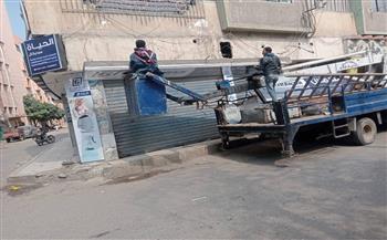 حملة لإزالة اللوحات الإعلانية المخالفة بنطاق حي ثان الزقازيق