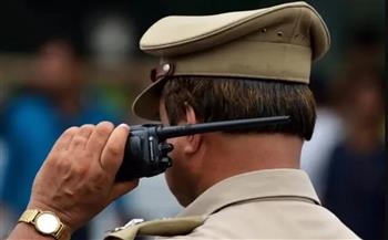 لص منحوس يعلق داخل نافذة مبنى حاول سرقته