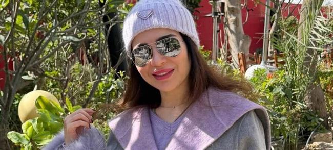 مي عز الدين واطلالة شتوية أنيقة في أحدث ظهور