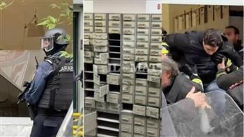 مسلحون يقتحمون فرع بنك بطريقة هوليودية ويهربون من الصرف الصحي