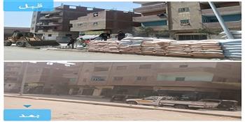  محافظة الجيزة تزيل تعديات مخزن أعلاف على الطريق العام بالطالبية  