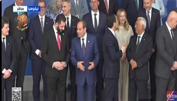 حوار جانبي بين الرئيس السيسي ونظيره السوري (بالصور) 