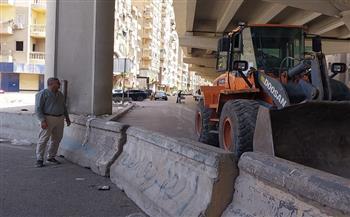 محافظة الجيزة: تركيب حواجز خرسانية بشارع الشيخ أحمد نصر لمنع السير عكس الاتجاه 