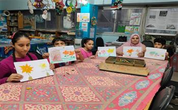 ورشة تعليم الرسم وحكي عن عيد العمال بمكتبة السلام الثقافية
