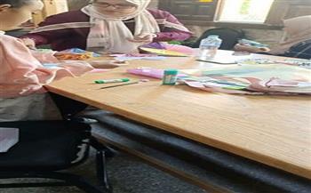 ورشة فنية بمكتبة الحديقة الخضراء لتشكيل عروسة المولد بالورق الملون